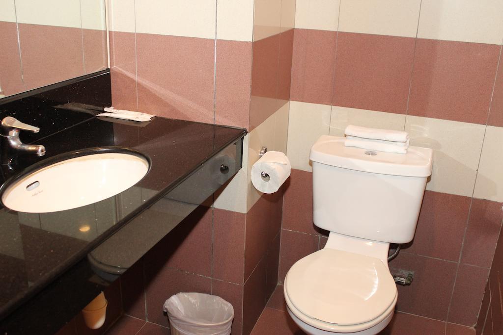 Classique Hotel Сингапур Стая снимка