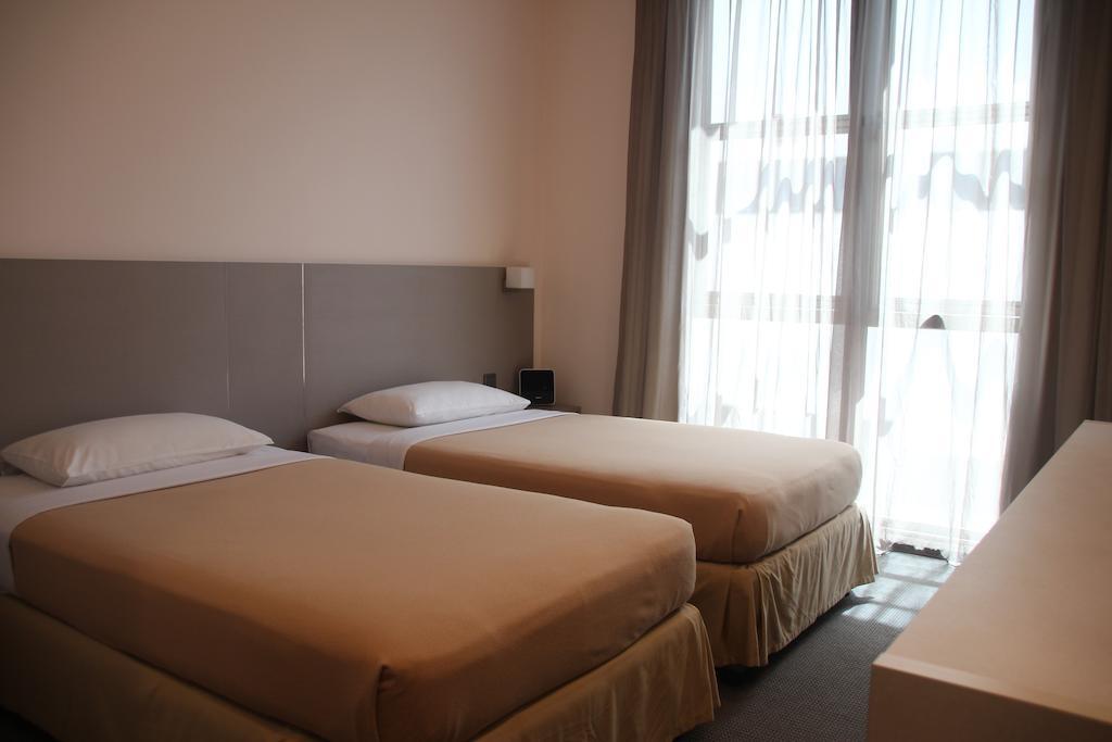 Classique Hotel Сингапур Стая снимка