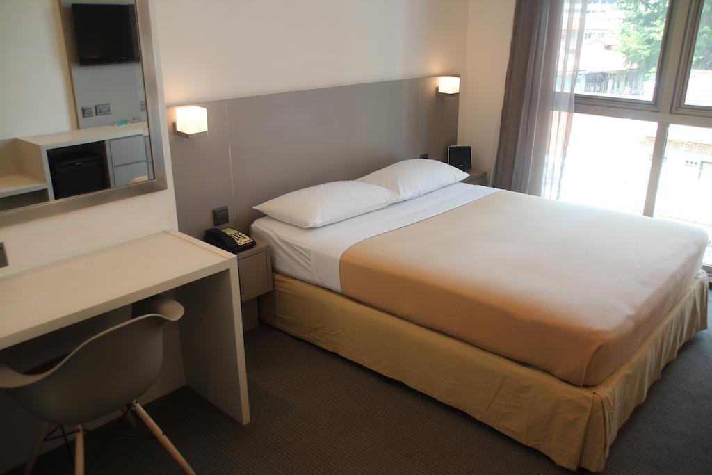 Classique Hotel Сингапур Стая снимка