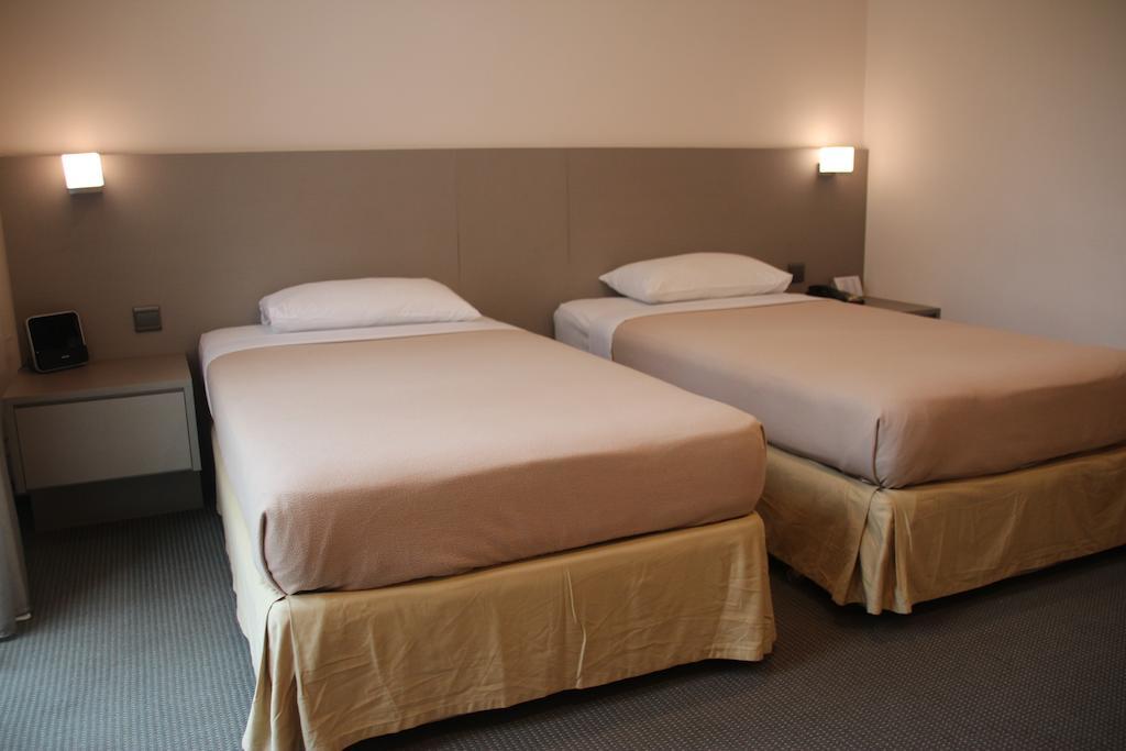 Classique Hotel Сингапур Стая снимка